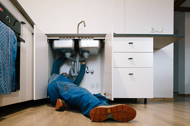 Professional Drain Cleaning technician working in Grand Bay, AL